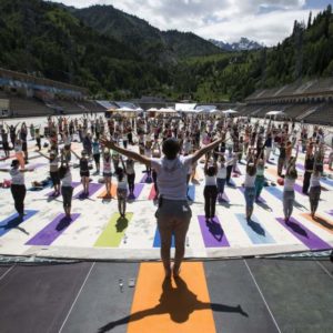 Participants attend the Yoga Fest to mark the International Day of Yoga at the Medeo skating rink at the altitude of some 1600 metres (5249 feet) above sea level in Almaty, Kazakhstan, June 21, 2015. REUTERS/Shamil Zhumatov